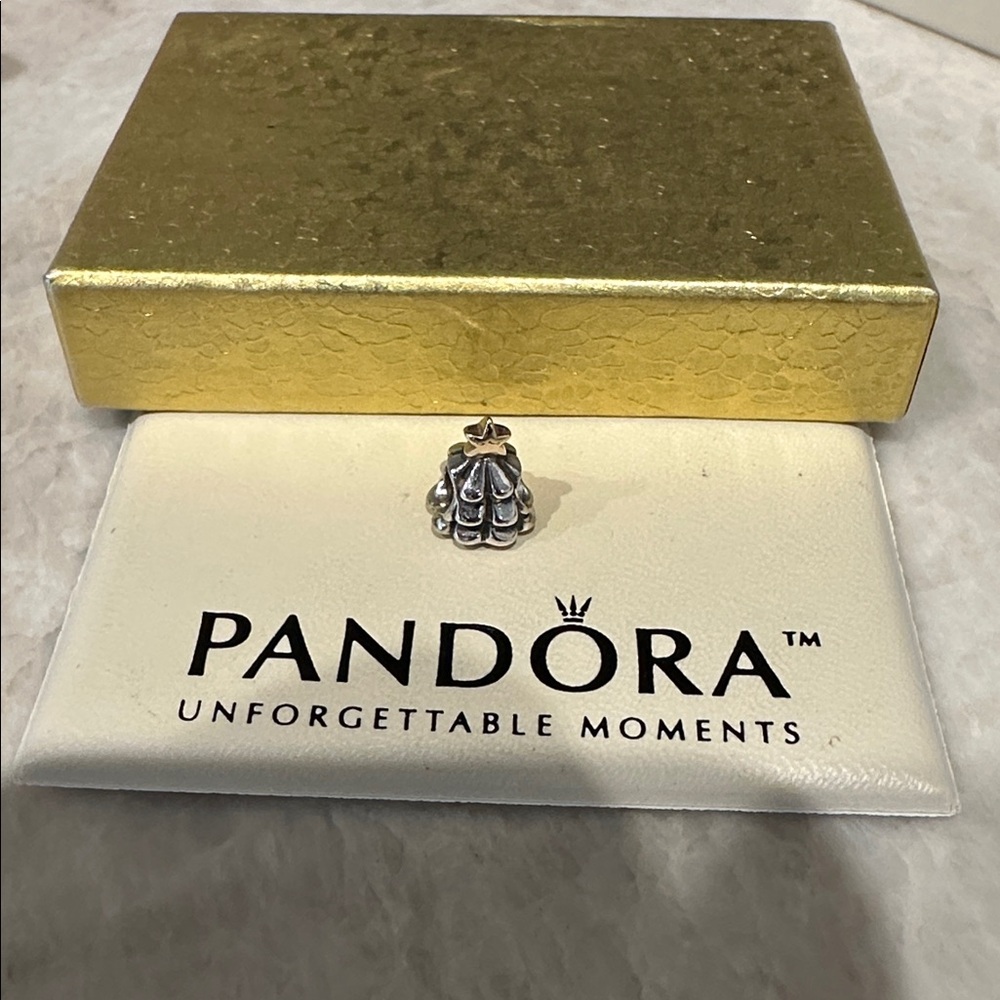 Pandora Silver Christmas tree with gold star on top.
